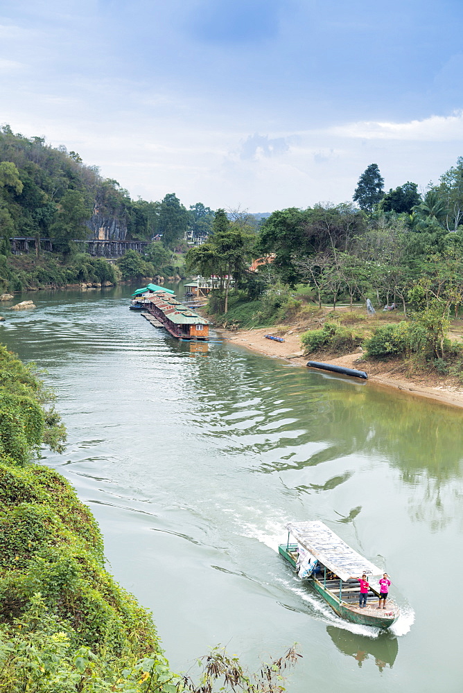 A boat on the River Kwai with the POW-built Wampoo Viaduct behind, Death Railway near Nam Tok, Kanchanaburi, Thailand, Southeast Asia, Asia