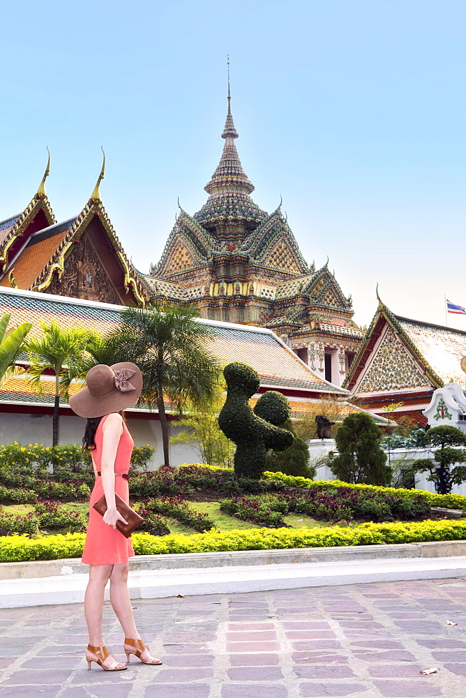 A young woman at Wat Pho temple in Bangkok, Thailand, Southeast Asia, Asia