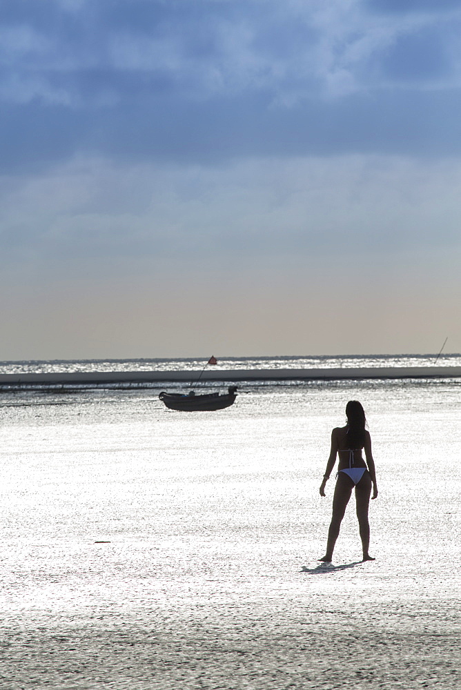 A young woman on Vila do Pesqueiro beach on Marajo island, Brazilian Amazon, Para, Brazil, South America