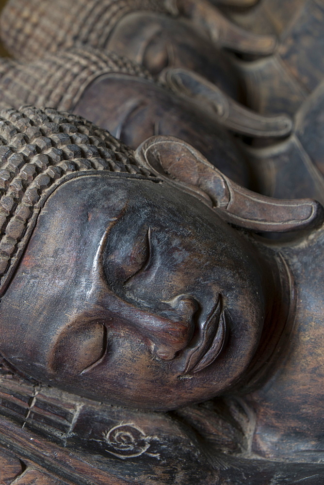 Carved Buddha heads, Phnom Penh, Cambodia, Southeast Asia