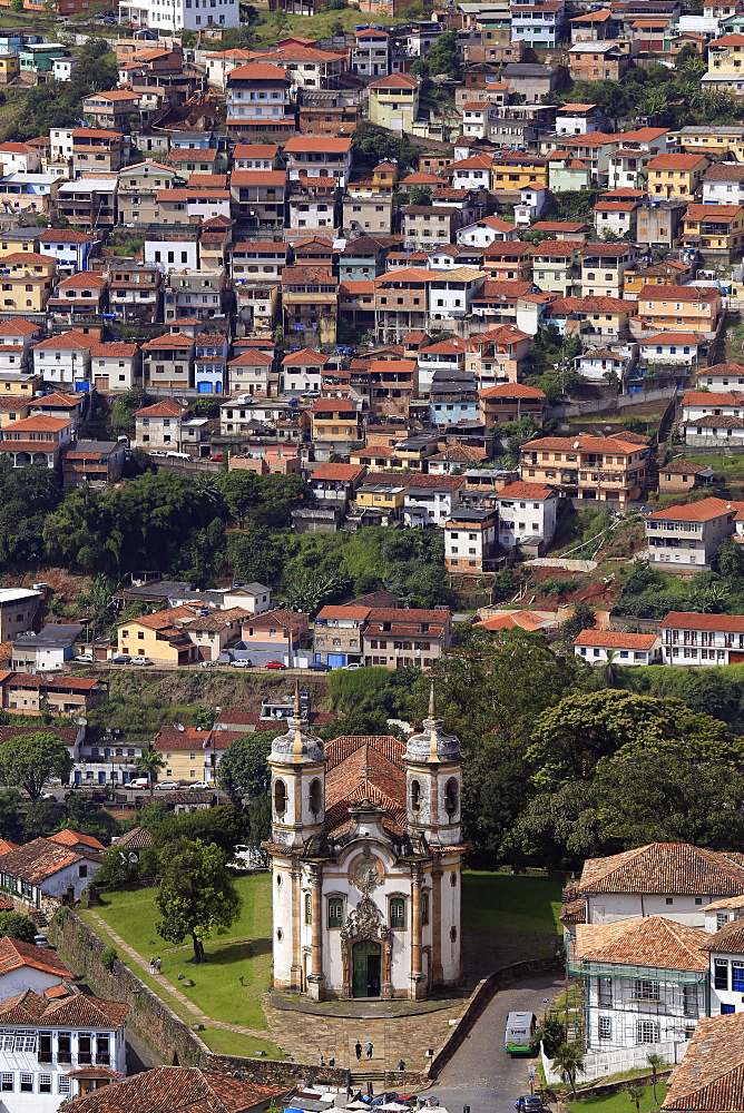 View of the Sao Francisco church with poor housing behind, Ouro Preto, Minas Gerais, Brazil, South America