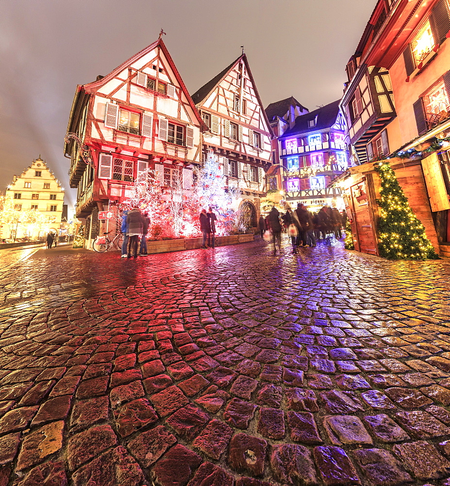 Panorama of typical houses enriched by Christmas ornaments and lights at dusk, Colmar, Haut-Rhin department, Alsace, France, Europe