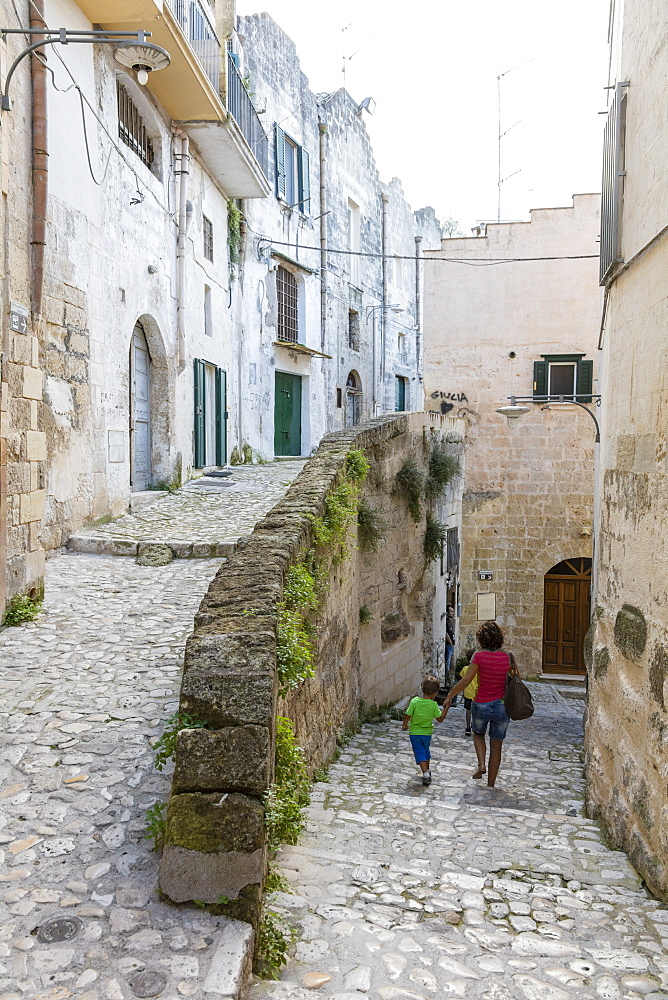 Typical stone alleys in the old town center of Matera also known as the Subterranean City, Matera, Basilicata, Italy, Europe