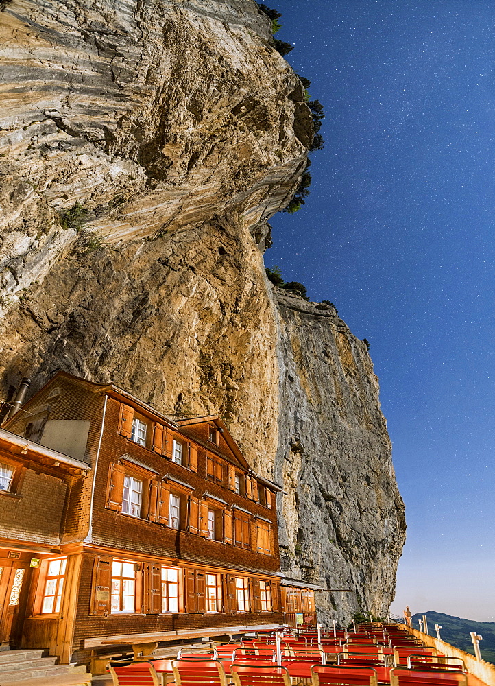 Panoramic of Aescher-Wildkirchli Gasthaus and outdoor restaurant at night, Ebenalp, Appenzell Innerrhoden, Switzerland, Europe