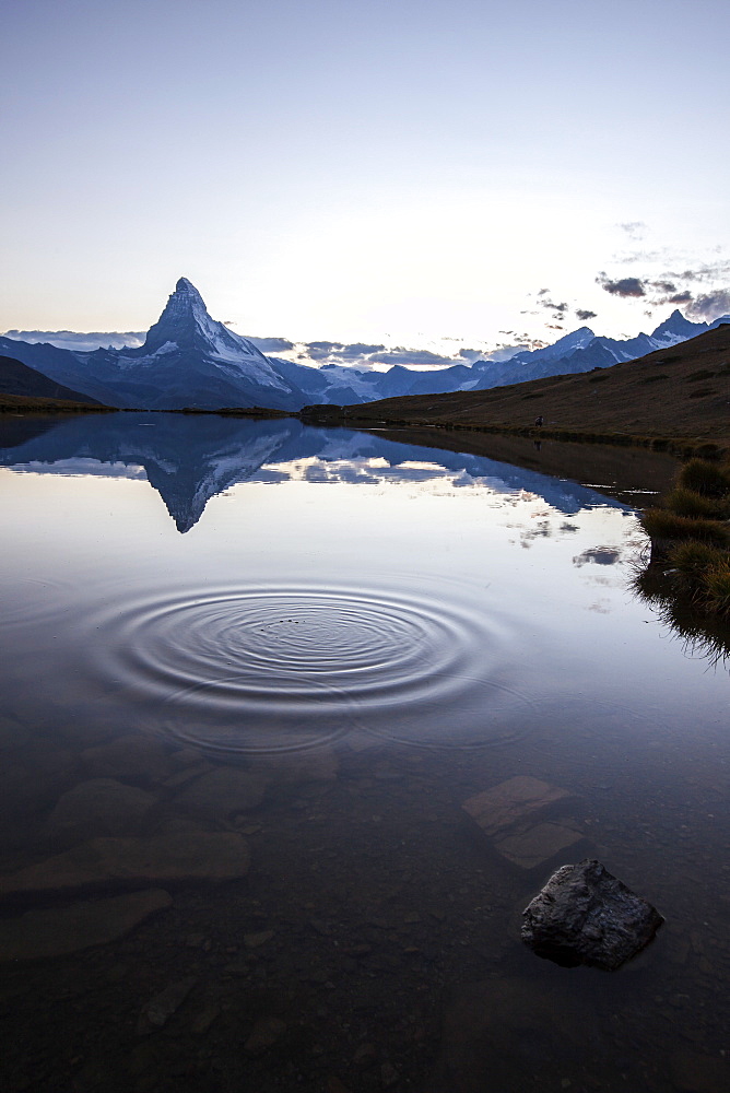 The Matterhorn reflected in Stellisee at sunset, Zermatt, Canton of Valais, Pennine Alps, Swiss Alps, Switzerland, Europe