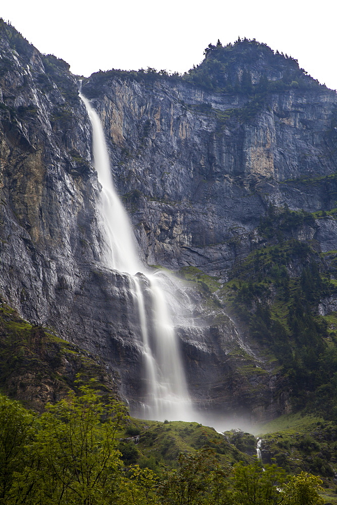 Waterfall in the Natural Park of Lauterbrunnen, Grindelwald, Bernese Oberland, Canton of Bern, Switzerland, Europe