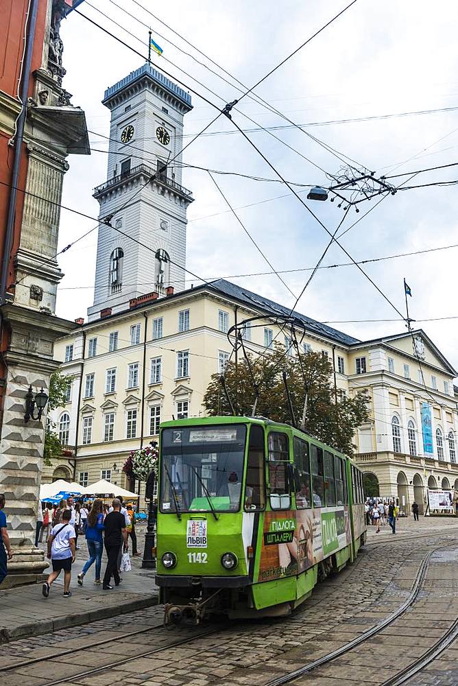 Tram in front of the Lviv City Council building, Lviv, UNESCO World Heritage Site, Ukraine, Europe