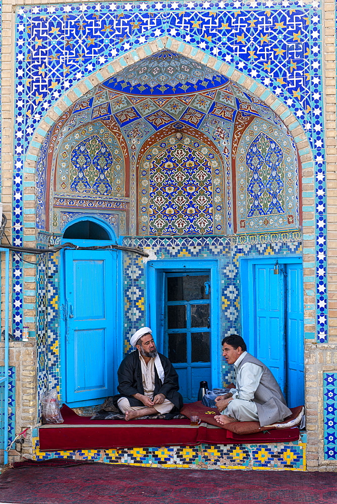 Men discussing in a corner of the Blue Mosque, Mazar-E-Sharif, Afghanistan, Asia