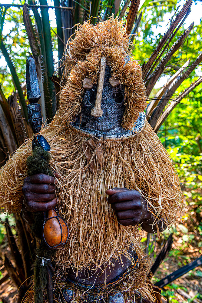 Traditional masked man, Yaka tribe, Mbandane, Democratic Republic of the Congo, Africa