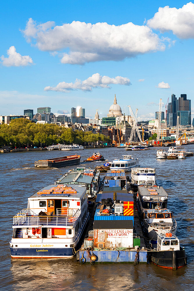 Boats on the River Thames, St. Paul's Cathedral and the City of London from Waterloo bridge, London, England, United Kingdom, Europe