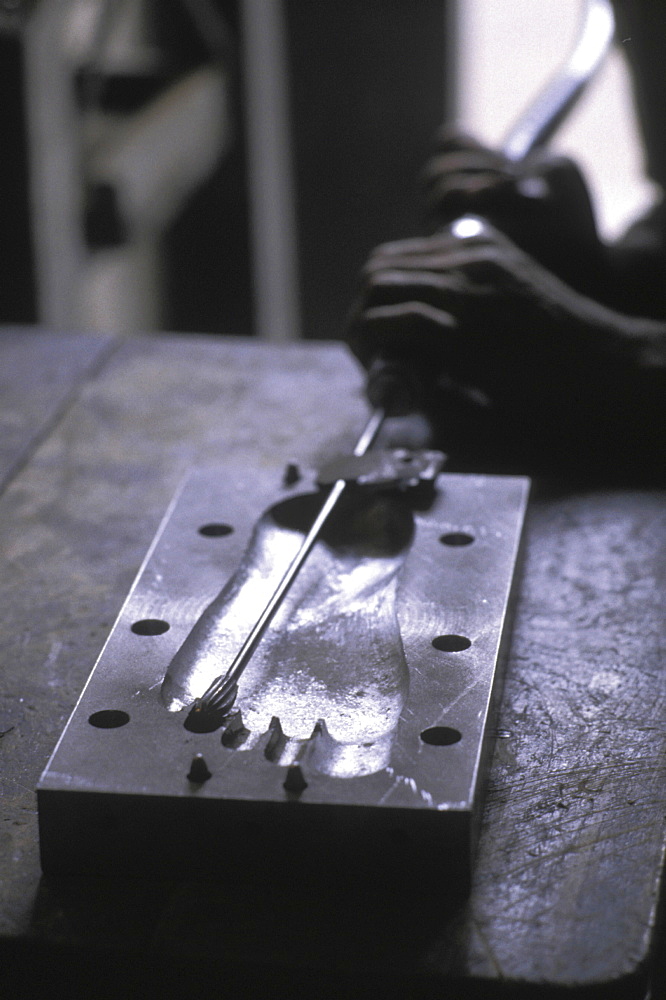 Healthcare, india. Jaipur. Local technicians fitting an artificial jaipur foot