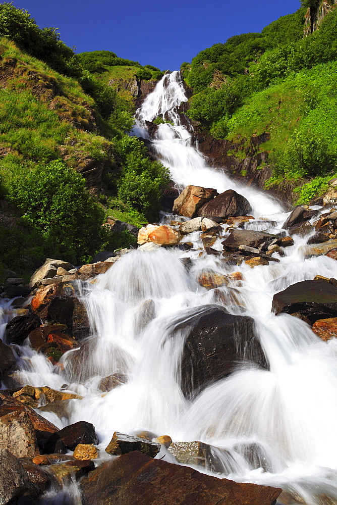 Waterfall in Swiss Alps, Switzerland