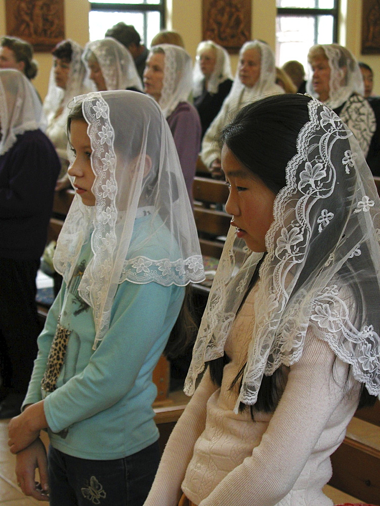 Russia - sunday mass at catholic church. Yuzhno sakhalinsk, sakhalin island, russian far east