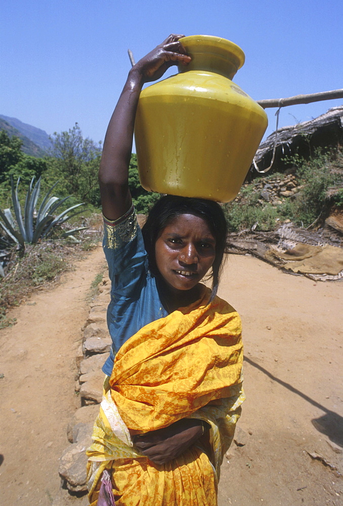 India - water womam carrying water from well, tamil nadu