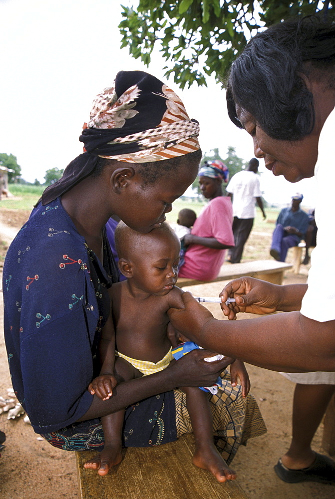 Ghana child receiving immunisation at a mother/child health clinic bongo, bolgatanga