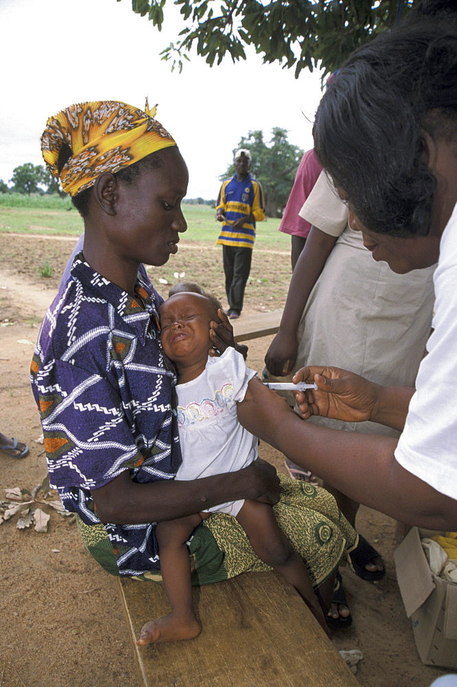 Ghana child receiving immunisation at a mother/child health clinic bongo, bolgatanga