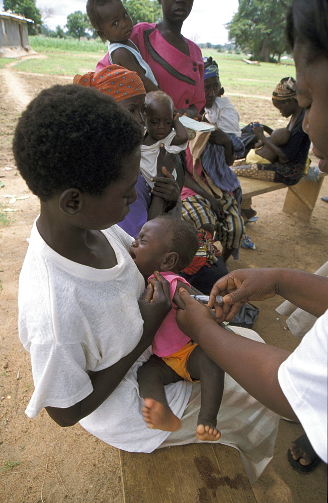 Ghana child receiving immunisation at a mother/child health clinic bongo, bolgatanga