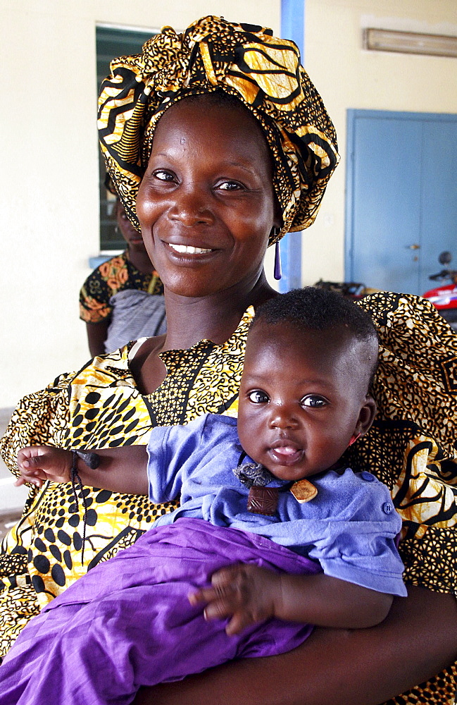 Gambia woman and waiting at clinic birkana