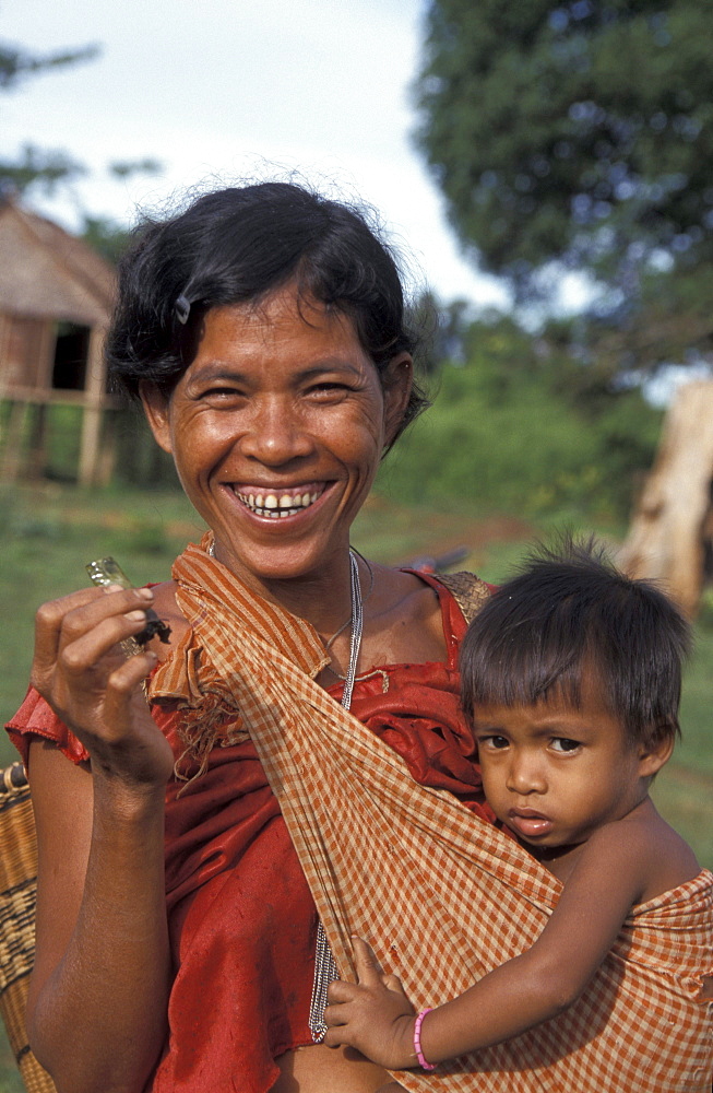 Cambodia kreung tribal woman and child, malik village, ratanakiri