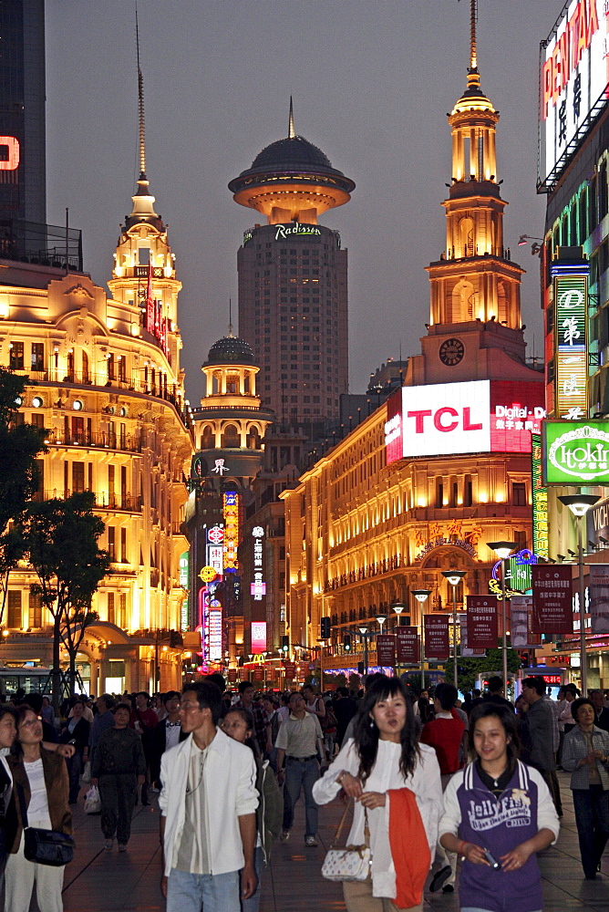 China nanjing road, one of the main shopping and tourist streets of shanghai. Neon signs.