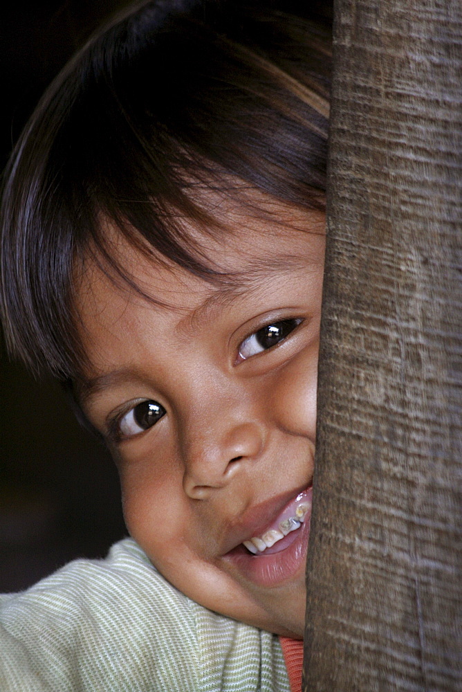 Guatemala santa rita village of returnees, in peten. community fled guatemala during violence of 1980s in times of peace have returned to settle in jungle lowlands. Child from village