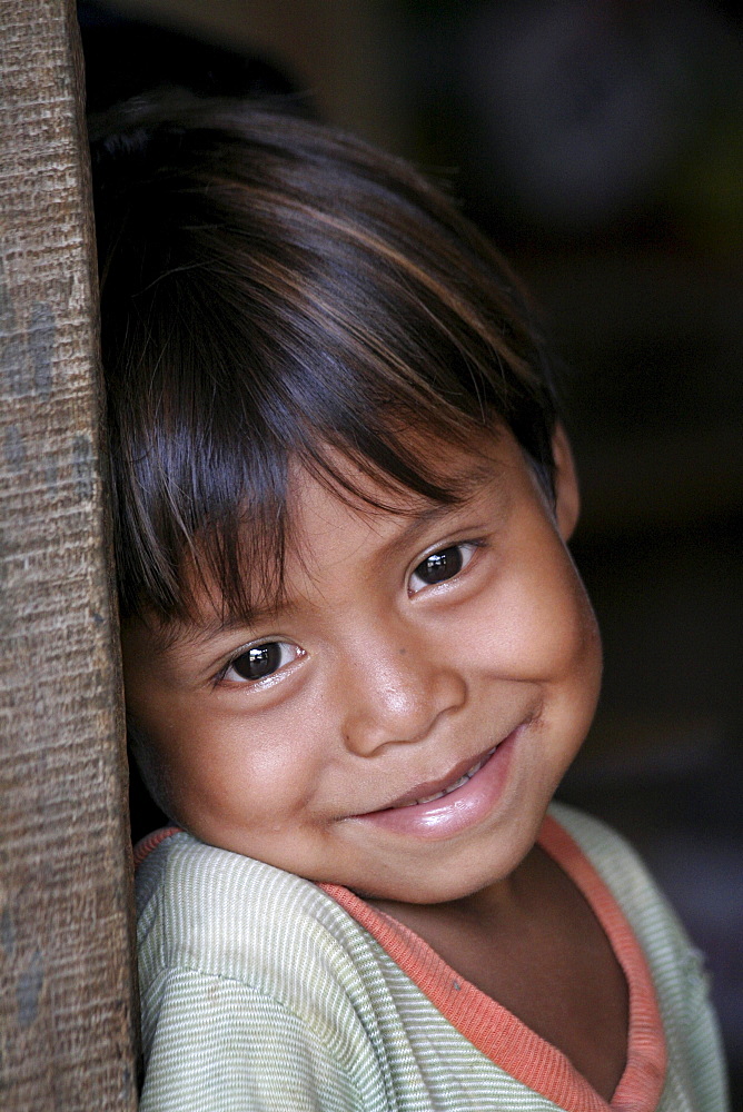 Guatemala santa rita village of returnees, in peten. community fled guatemala during violence of 1980s in times of peace have returned to settle in jungle lowlands. Child from village