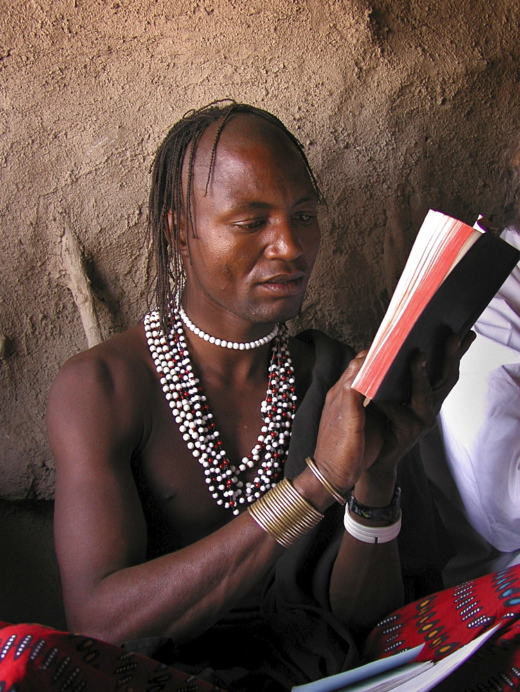 Watatulu tribals at catholic mass in a hut, tanzania. Mwankale