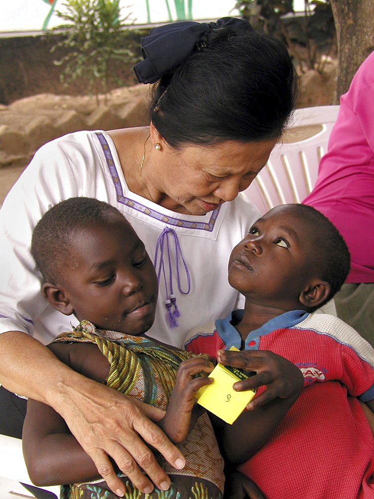 Catholic sister with aids orphans, tanzania. Musoma