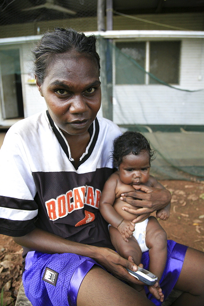 Australia mother and child living in aborigine community of , or beswick, arnemland, northern territory