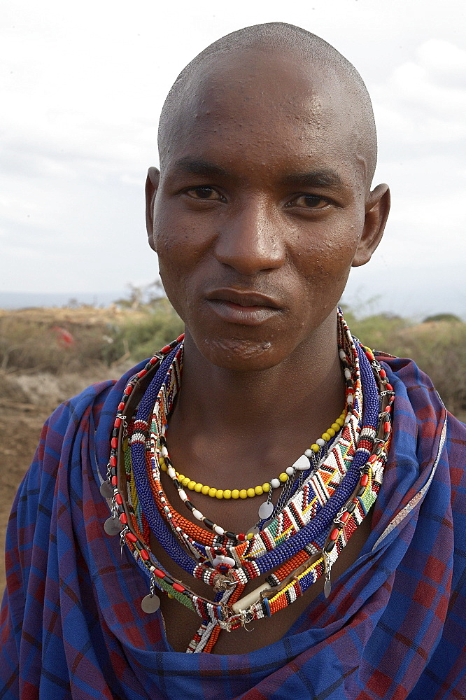 Kenya. Young masai man, masai village within the amboseli national park