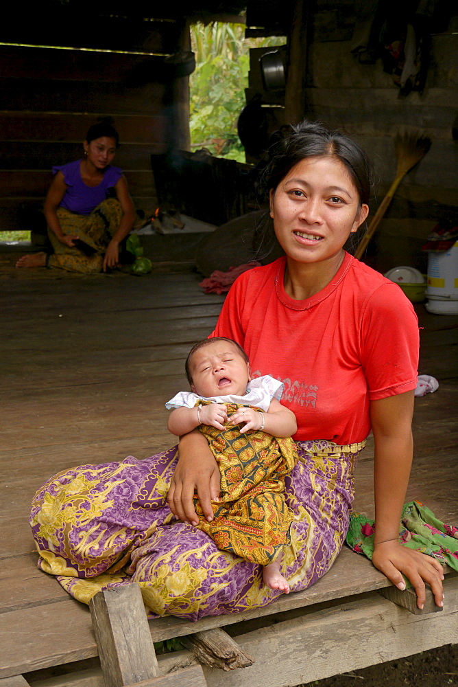 CAMBODIA Lib Kham (23) with her newborn baby, Ban Bung village, Stung Treng district