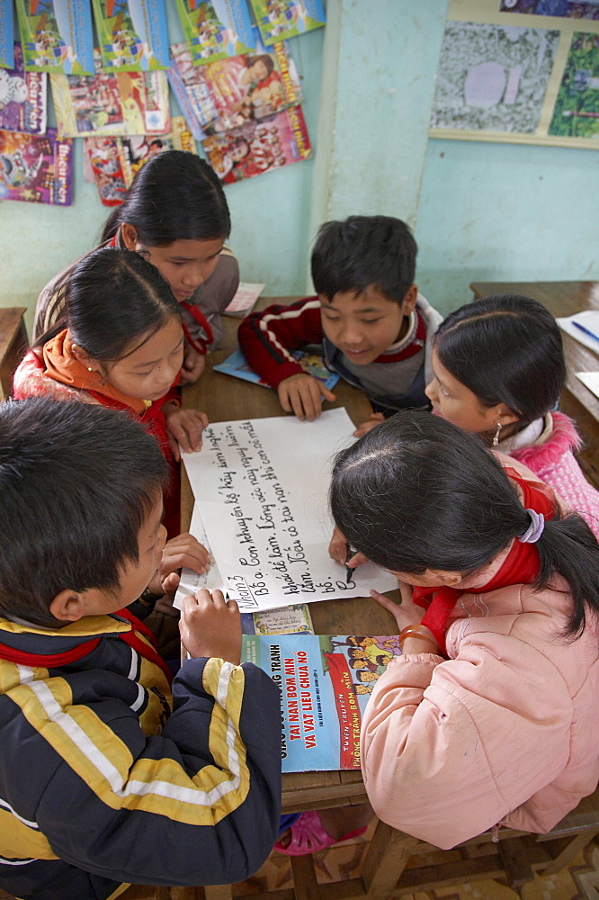 Vietnam mine risk education program in tan hop primary school in quang tri province. children are taught about the dangers of finding unexploded bombs or landmines, dating from the war with the usa. progarm sponsored by american catholic relief services (crs)