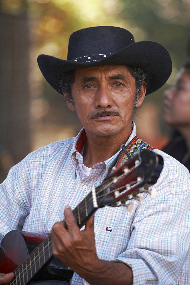 El salvador el mozote, site of the massacre of children in 1981. face of person attending annual memorial celebration