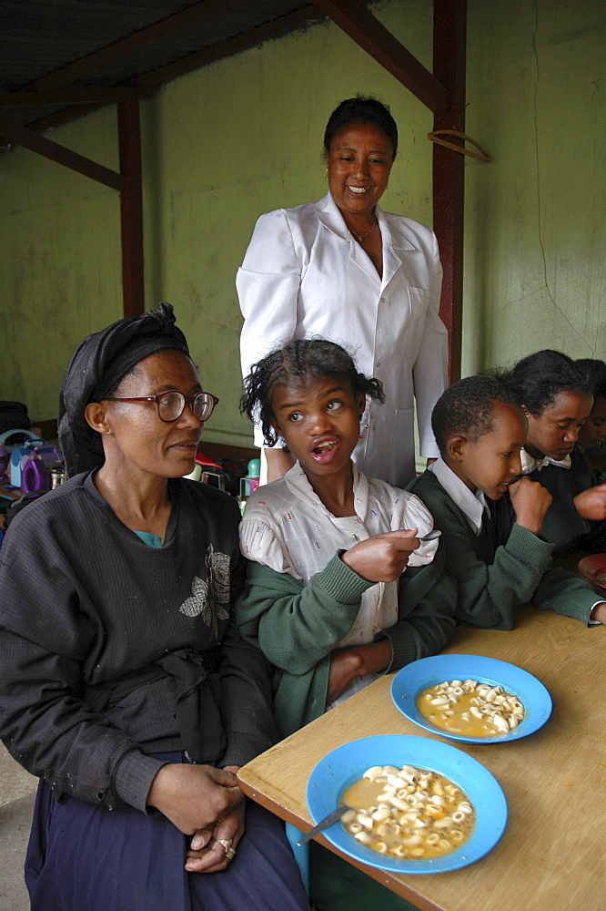 Food, ethiopia. Saint maryâˆšÂ¢Â¬Ã„Â¬Ã´s catholic school, addis ababa. A mainstream elementary and secondary school, it has a small wing for special needs children, which is featured here. Betty and her mother feleku (on left) who helps with preparing food at the center. Other parents participate in rotation