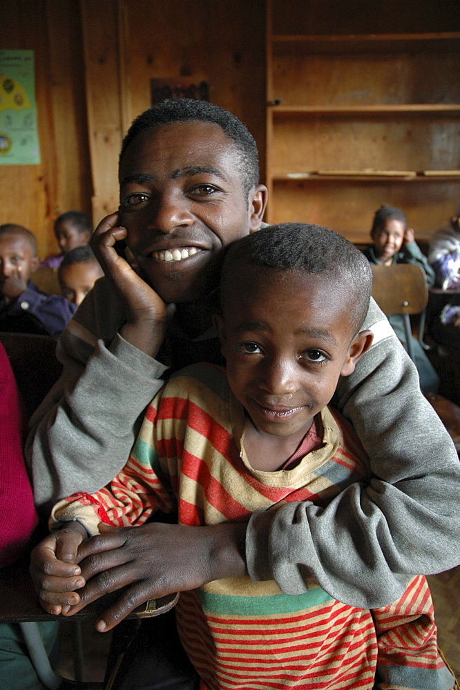 Disability, ethiopia. Urban development project of the daughters of charity, kabille 18, addis ababa. The project helps poor people with disabilities and health problems. Father and son at the center