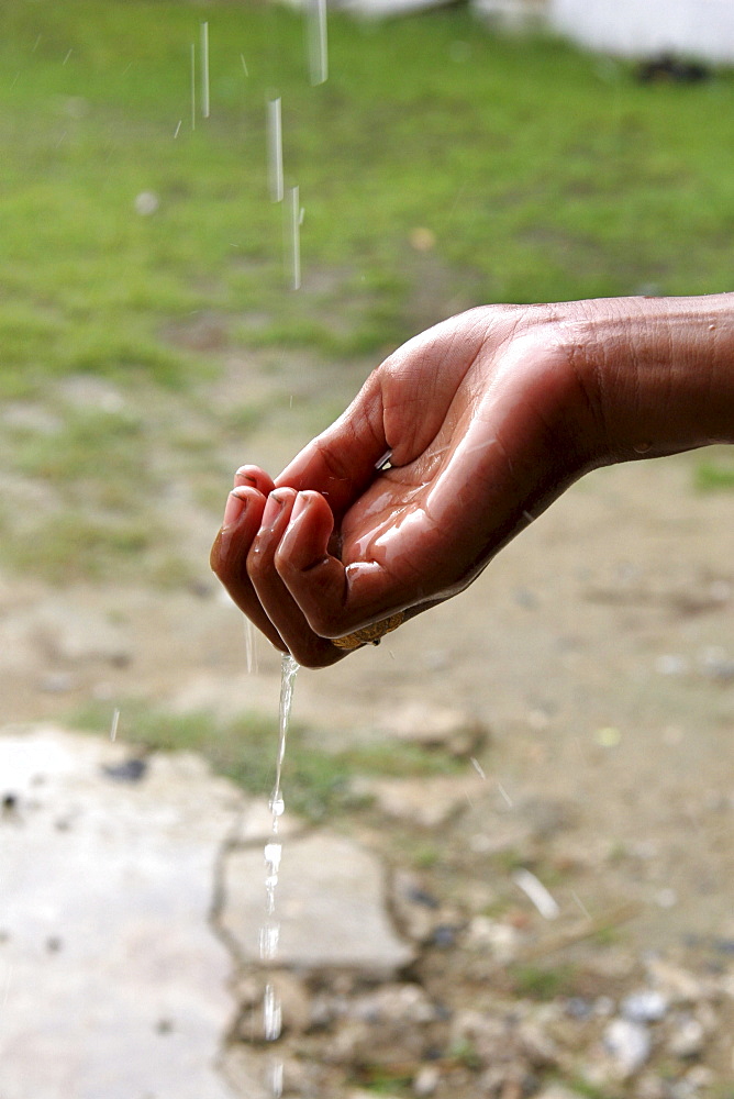 Thailand hand catching rain drops, pattani