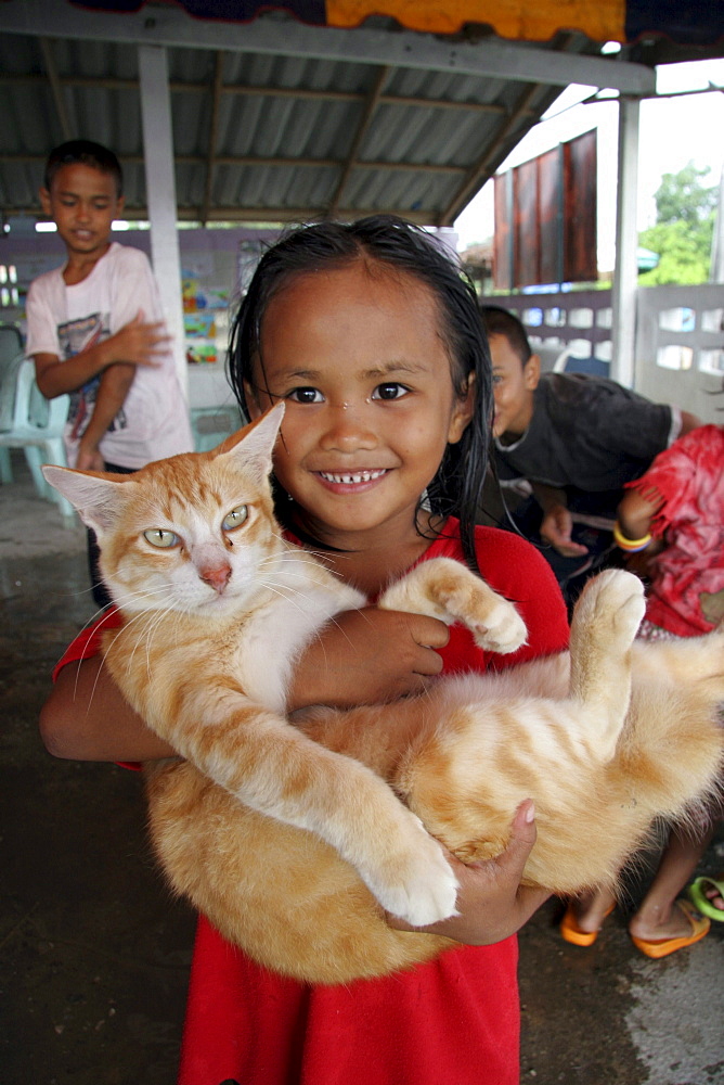 Thailand girl with cat. Pattani