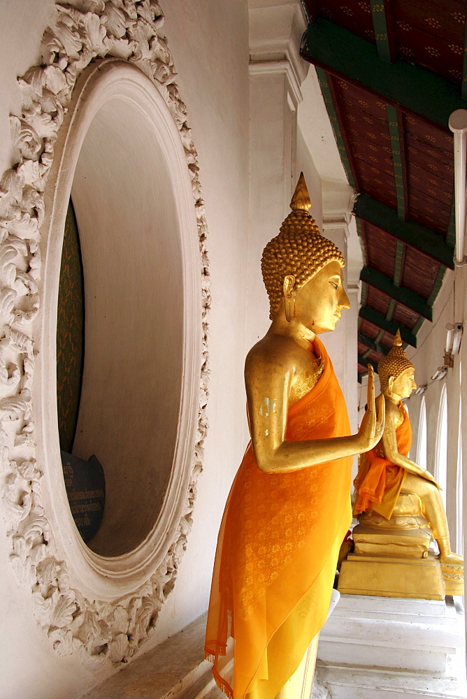 Thailand buddha statues at ancient buddhist temple and stupa of phra pathom chedi, nakhon pathom