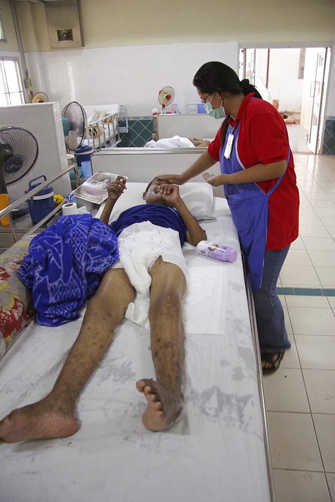 Thailand hiv+ patients in an aids hospice at a buddhist temple in lopburi