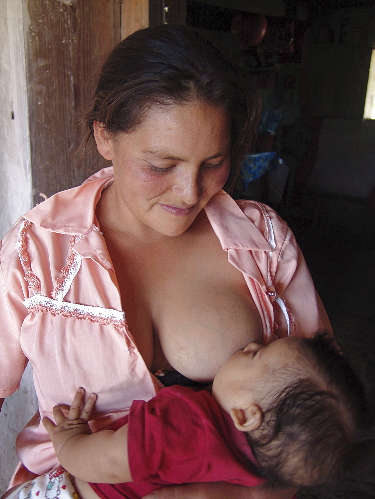 Honduras woman breastfeeding her baby. Marcala