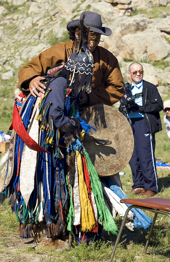 Invocation of the tengir (celestial) forces by means of drumming and dance. Like the sun, fire is a the shamans often wear a ?light-protecting visor? Over their eyes. The radiance of the celestial spirits can be extremely strong, and this protects the onlookers from the blast of light when the celestial spirits enter the body of the shaman. 13th century national park, tov province, mongolia. 13th century national park comprises chinggis khan's giant statue museum and live museum "town from 13 century". The ancient nomadic mini kingdom is located in the distance of 130 km east of ulaanbaatar in area of erdene zuu of tov province. It takes 2 hours driving on paved road. In the live 13th century kingdom one will see and experience the authentic lifestyle of mongols, who were lived in powerful mongol empire?s Period. This place gives you a same feeling that famous traveler marco polo and william rubruck felt once upon time