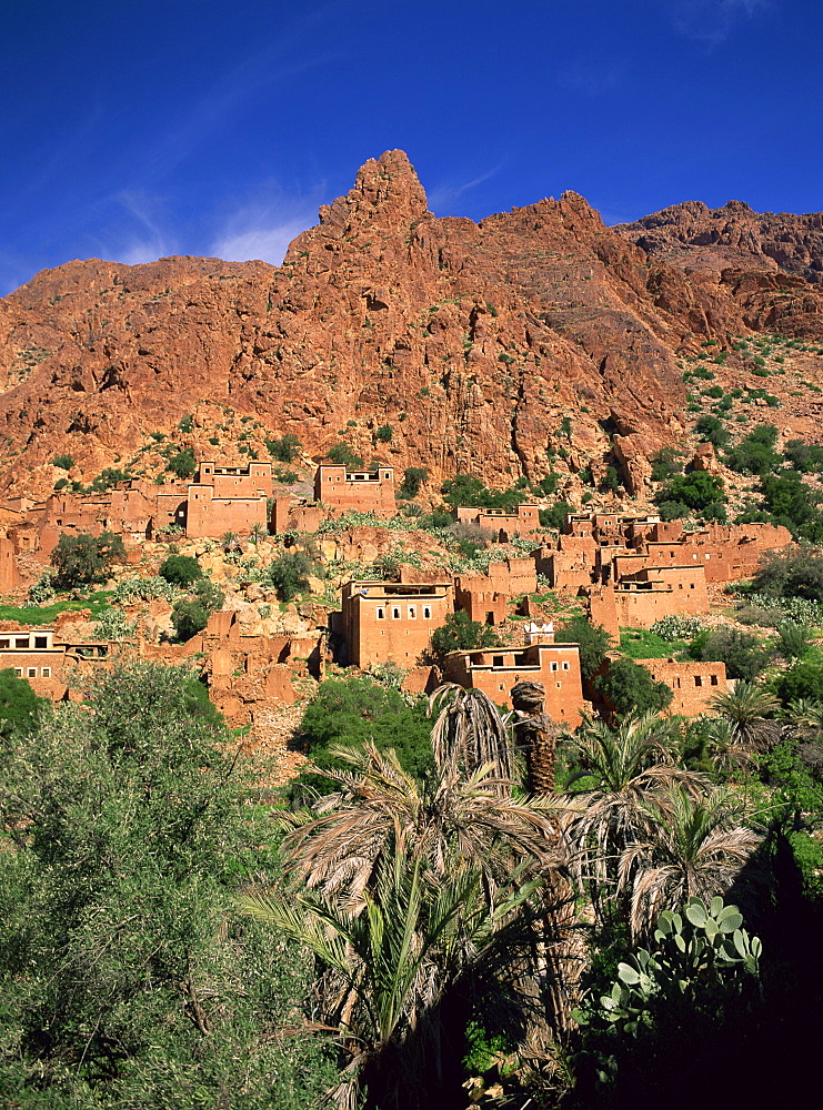 Village of Oumesnate and behind, the Djebel El Kest Ameln Valley (Almond), Tafraoute, Anti Atlas Region, Morocco, North Africa, Africa