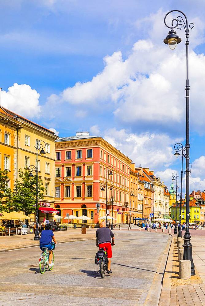 Cyclists cycling in Warsaw, Poland, Europe