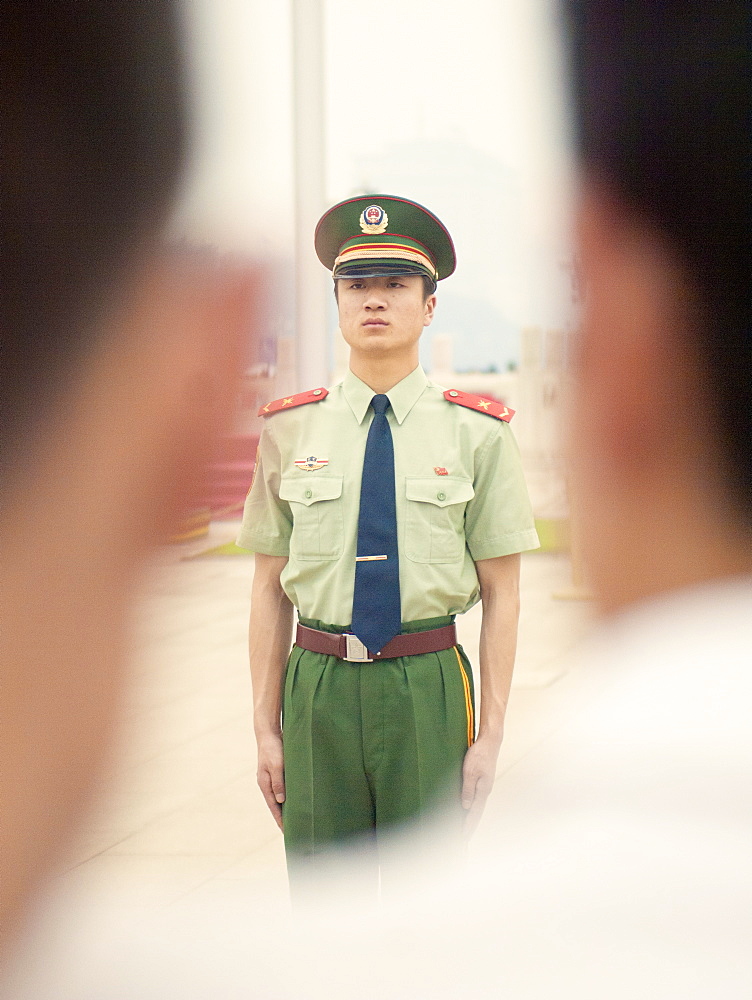 Policeman on guard, Tiananmen Square, Beijing, China, Asia