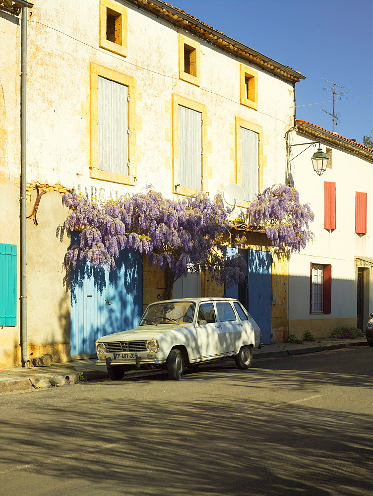 Classic french car and wisteria, Lacapelle Biron, Lot-et-Garonne, France, Europe