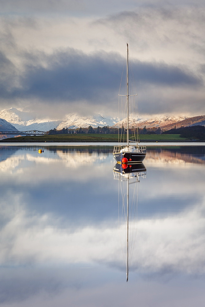 The still waters of Loch Leven near Ballachulish on a winter morning, Glencoe, Scottish Highlands, Scotland, United Kingdom, Europe.