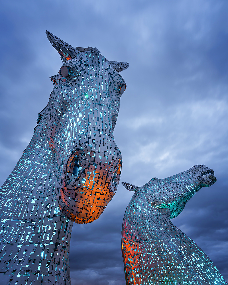 The Kelpies at blue hour, Forth and Clyde Canal at Helix Park, Falkirk, Stirlingshire, Scotland, United Kingdom, Europe