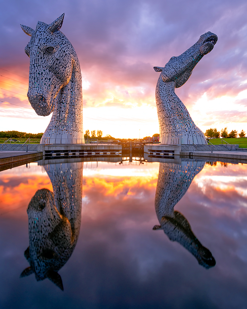 The Kelpies at sunset, Forth and Clyde Canal at Helix Park, Falkirk, Stirlingshire, Scotland, United Kingdom, Europe