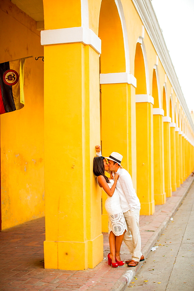 Couple posing in the street, Old Walled-in City, Cartagena, Colombia, South America