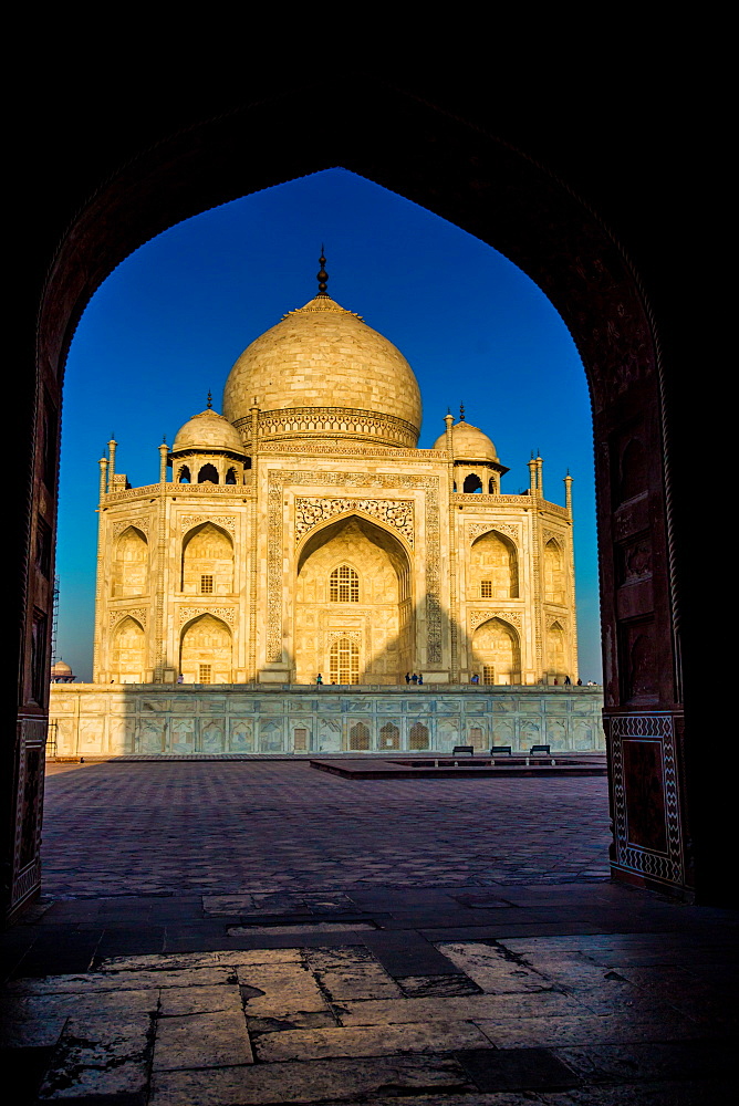 View of the Taj Mahal through a doorway, UNESCO World Heritage Site, Agra, Uttar Pradesh, India, Asia